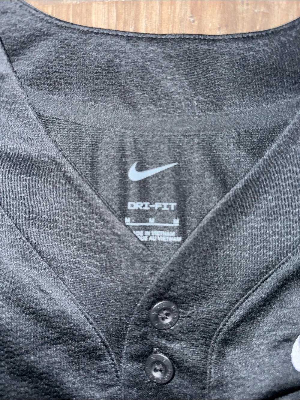 Nike Black Short-Sleeve Athletic Shirt with Yellow Duck Logo